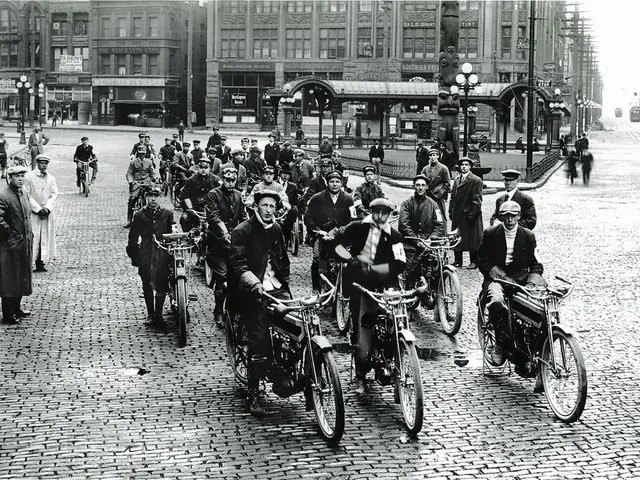 It is the black and white in which there are so many people sitting on the cycles. In the...